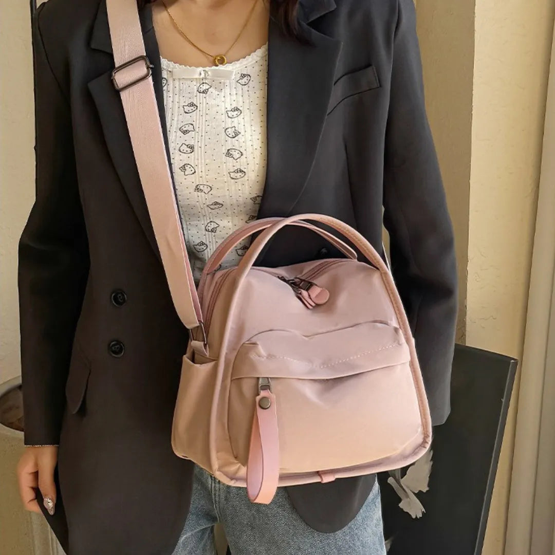 Bolso Amalfi en rosa llevado con americana