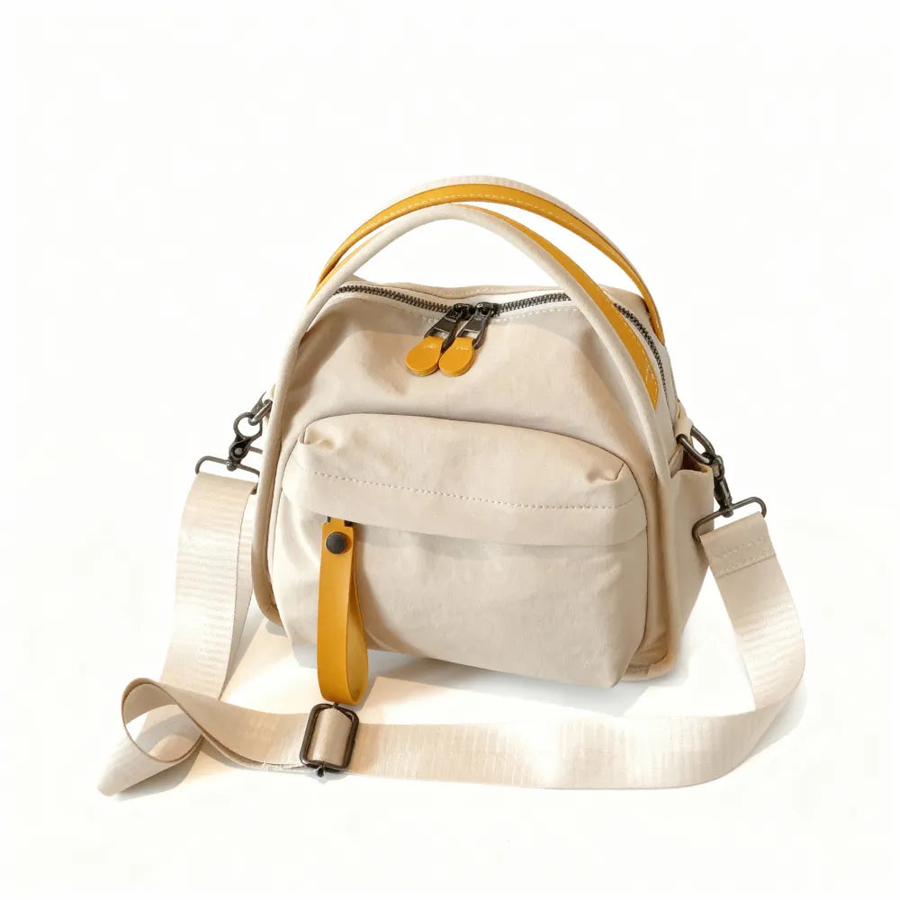 Bolso Amalfi en beige y amarillo, vista tres cuartos